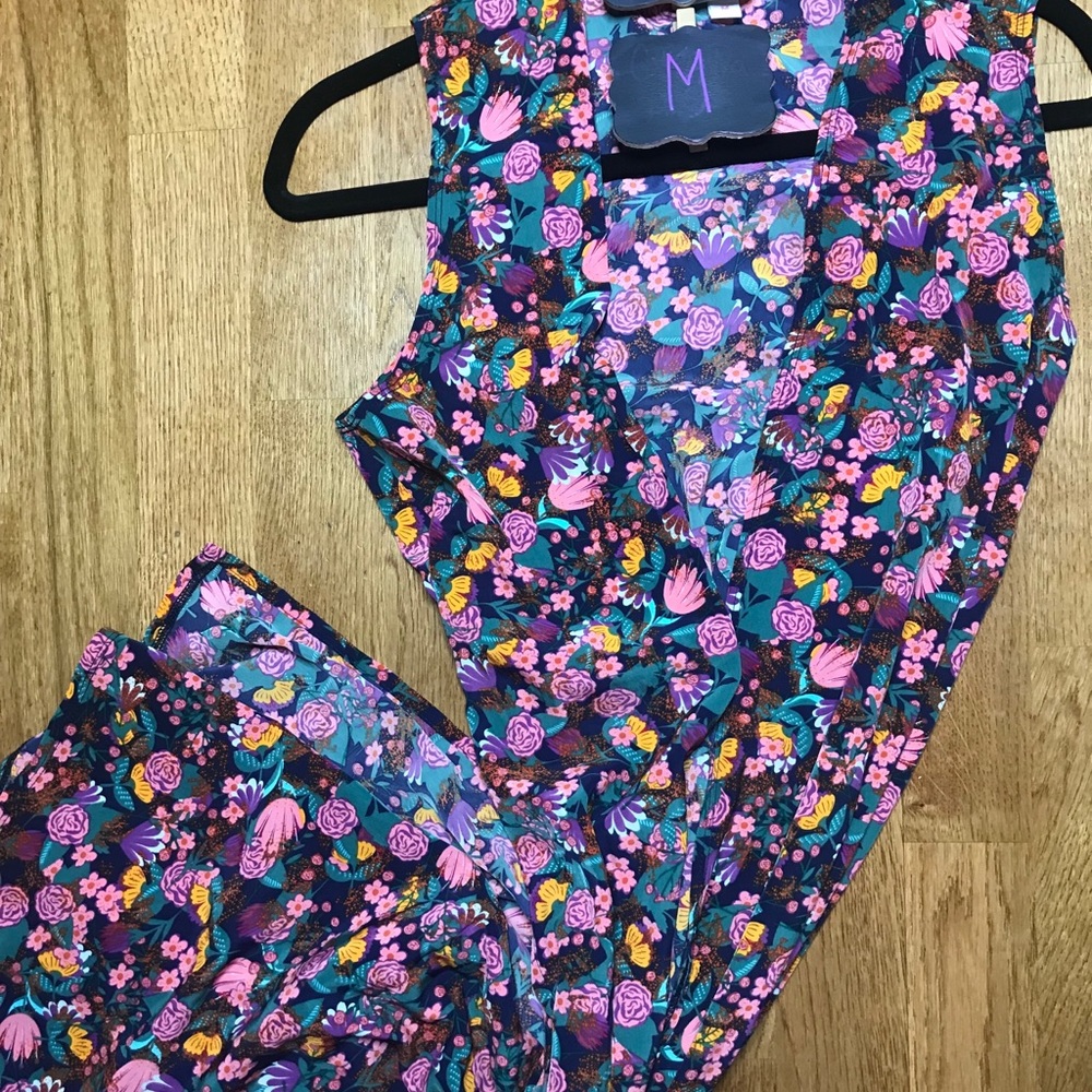 Medium floral Lularoe Joy vest.